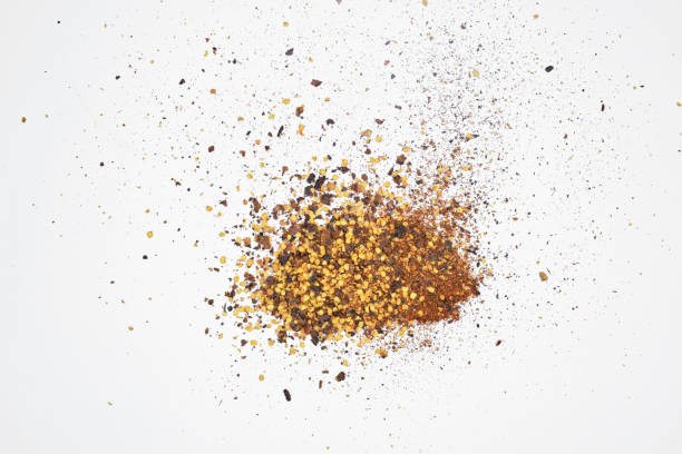 istock Red hot Chili pepper powder on white background 1270546314