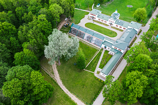 ZALESSE, BELARUS - JUNE 7, 2020: Old manor with beautiful park of the famous composer Michal Oginsky. Was built in 1822. Travel in Belarus. Aerial drone view.