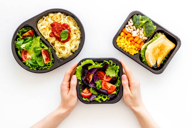 istock Food delivery background. Take away meal in boxes. Top view 1270553690