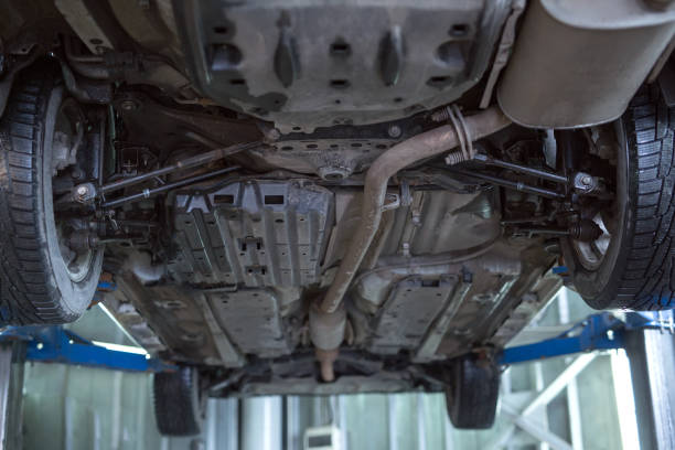 istock Auto mechanic working in garage. Repair service. 1270557694