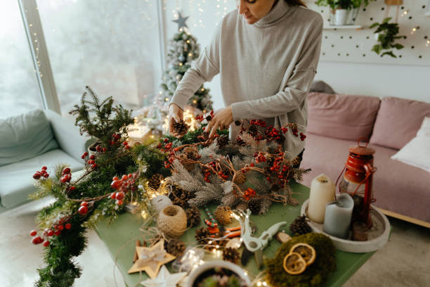 istock Young woman making a Christmas wreath 1270560647