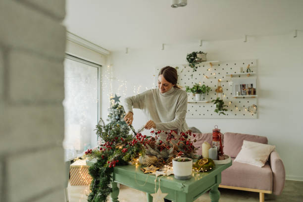 istock Young woman making Christmas decorations 1270560648