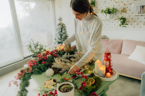 istock Young woman making Christmas decorations 1270560671