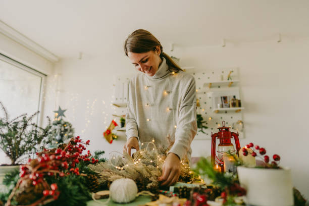 istock Millennial woman making Christmas decorations 1270560681