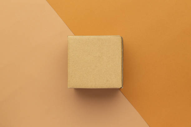 istock Paper cardboard boxes mockup template on half beige and brown background 1270561765