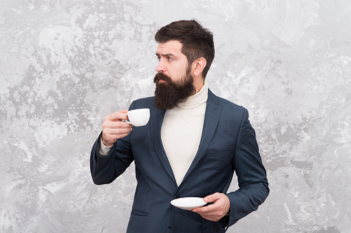 Business people fashion style. Smart casual style clothes for office life. Best coffee served for him. Specialty coffee. Man handsome bearded businessman hold cup of coffee. Coffee break concept.