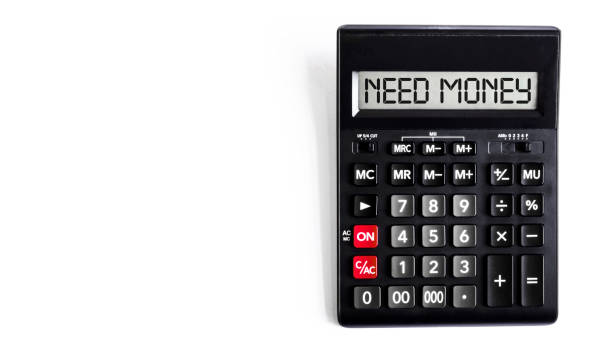 istock black calculator with text Need Money on the white background 1270564663