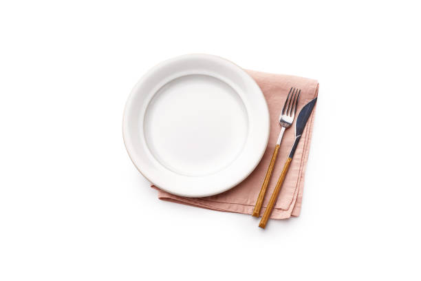 istock Top view of empty plate isolated on white background 1270566767