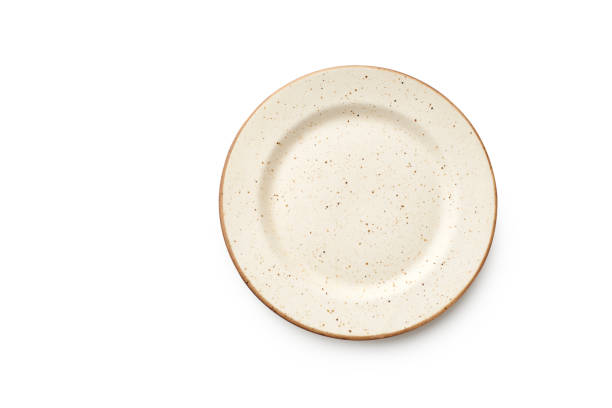 istock Top view of empty plate isolated on white background 1270566781
