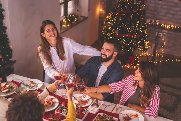 istock Friends making a toast during Christmas dinner 1270566972