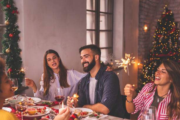 istock Friends having fun during Christmas dinner 1270567086