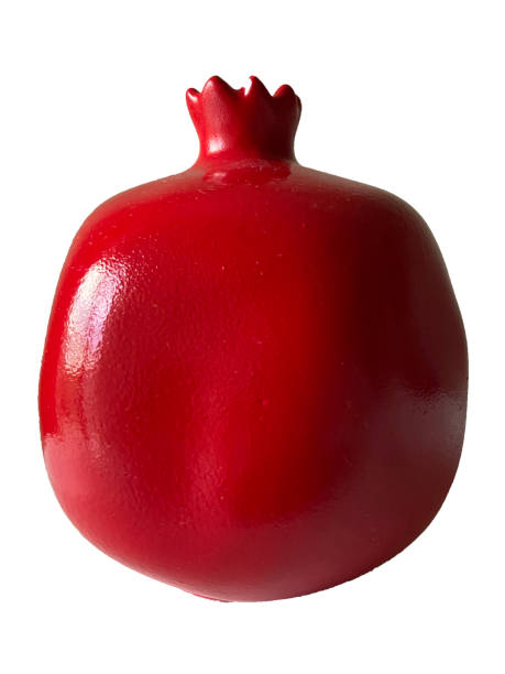 istock Pomegranate fruit decorative trinket red colorful isolated on white background. 1270568700
