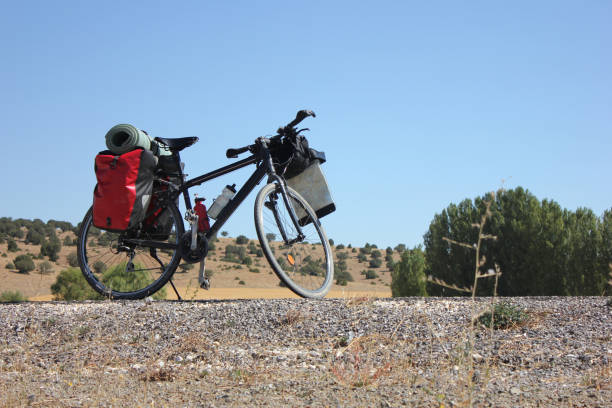 istock Bicycle loaded with trekking and camping equipment. 1270568833