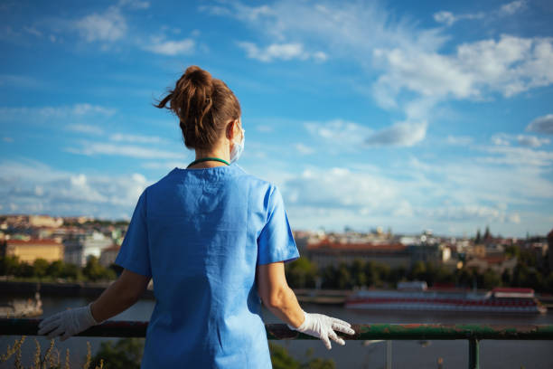 istock modern medical practitioner woman outside against sky 1270569605