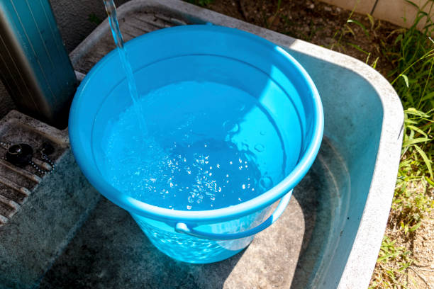 istock Collect water in a bucket 1270570172