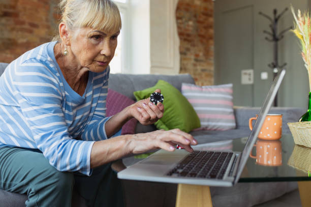 istock Senior woman studying at home, getting online courses 1270570843