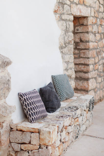 istock Geometric pillows near a wall in a garden 1270571423