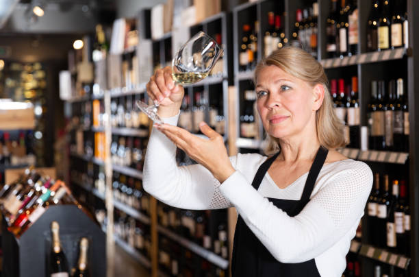 istock Woman sommelier tasting wines in winery 1270572464