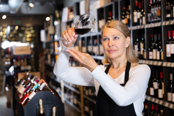 istock Woman sommelier tasting wines in winery 1270572480
