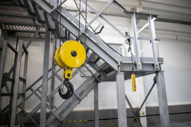 istock Swivel chain hook of electric hoist in workshop, chain block, pullers 1270578816