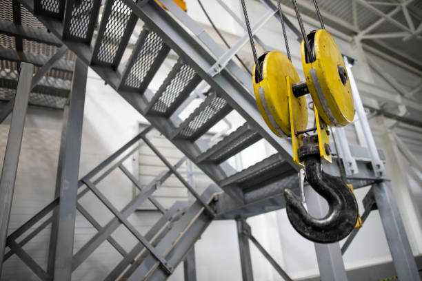istock Swivel chain hook of electric hoist in workshop, chain block, pullers 1270579902