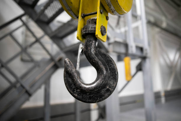 istock Swivel chain hook of electric hoist in workshop, chain block, pullers 1270579938