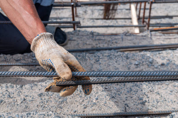 istock A man's hand in gloves holds a rebar 1270582505