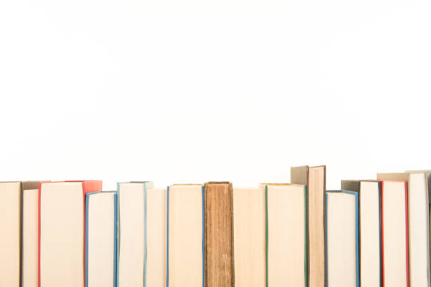 istock Row of books on a white background with space for copy 1270582543