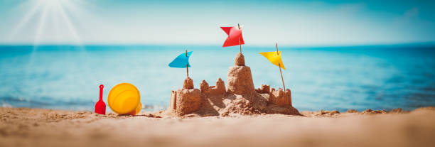 istock Sandcastle on the sea in summertime 1270583222