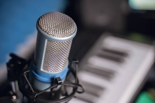 istock microphone in recording studio, close up, blurry background 1270584626