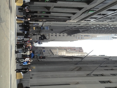 Manhattan city center views with skyscraber and crowd and famous architectures