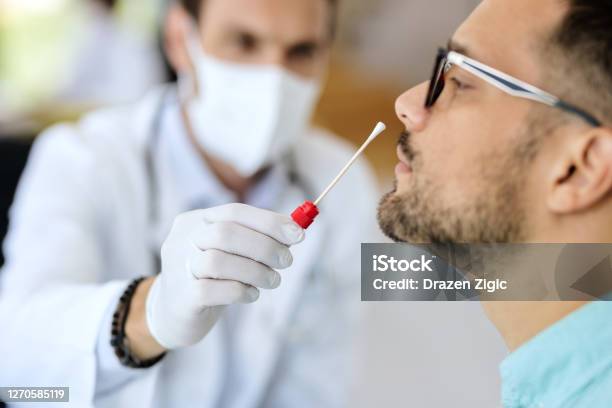 Closeup Of A Man Having Pcr Test At Medical Clinic Stock Photo - Download Image Now