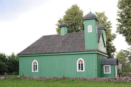 Wooden green mosque in the village of Kruszyniany, in Podlaskie Voivodeship, in eastern Poland where Polish Tatars live