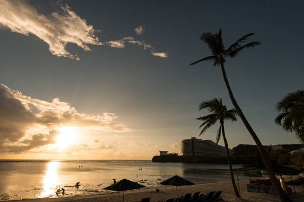 Sunset over Tumon Bay, on the US island territory of Guam, draws tourists from all over. Guam is known for its beautiful beaches and clear ocean water. It also played an important role during World War 2.
