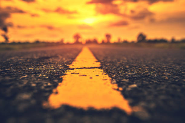 istock Close up traffic line on the ground and sunset. 1270603708