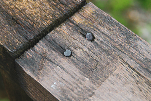 wooden planks aged by exposure to atmospheric phenomena.