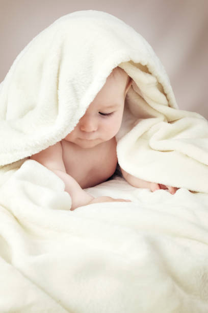 istock Cute baby in a towel 1270608237
