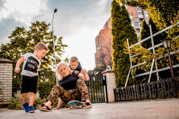 istock Children having fun with their grandmother. 1270609635