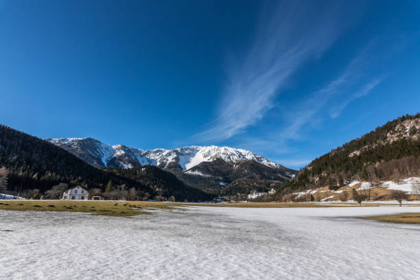istock snow mountain with forest snow and sky 1270609846