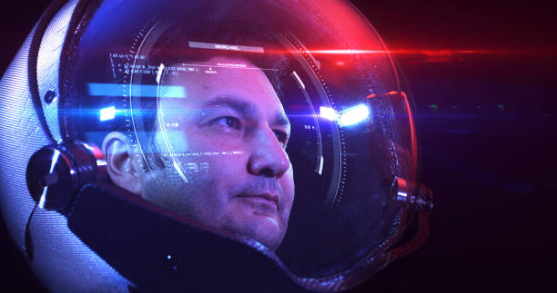 istock Young Brave Male Astronaut In Space Helmet Looking At Camera Slowly - VFX 1270610389