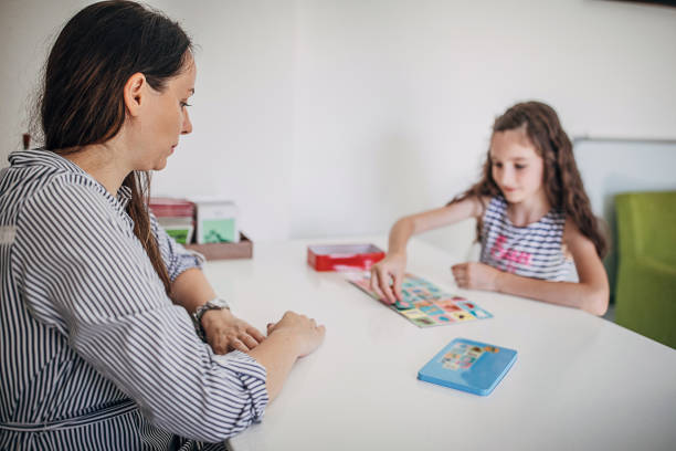 istock Young female student with the help of a teacher learning how to recognize different species of animals 1270612838
