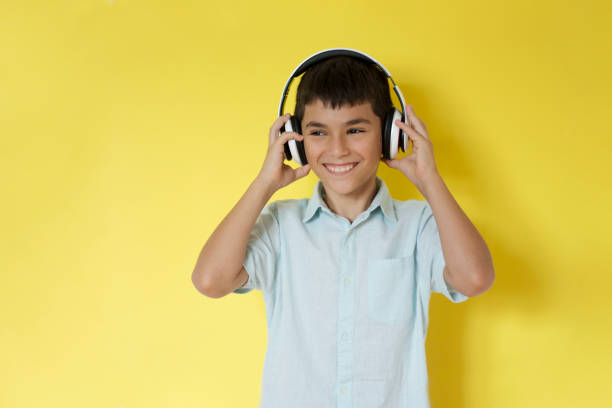 istock Little boy wearing headphones 1270612997