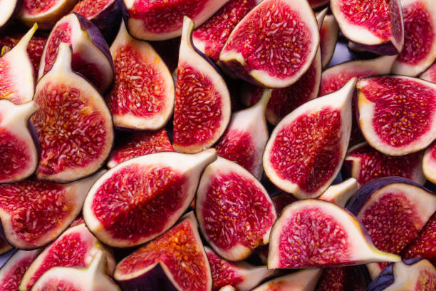 istock Tasty figs background. Top view. 1270614297