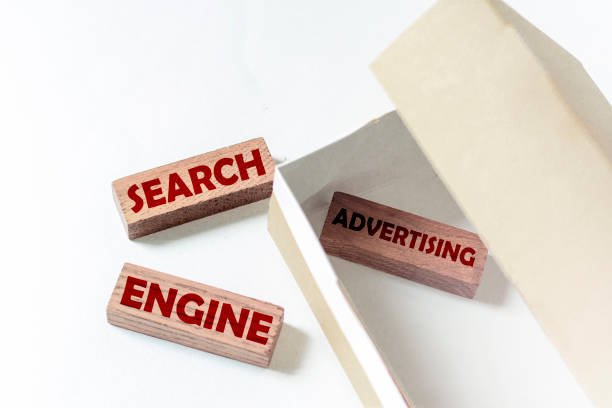 istock wooden blocks with text SEA Search Engine Advertising in a box on a white background 1270617292
