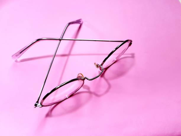 istock Glasses for vision on a pink background 1270620101
