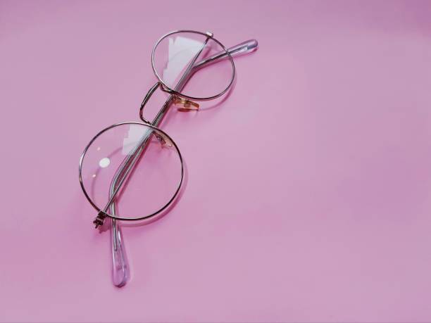 istock Glasses for vision on a pink background 1270620200
