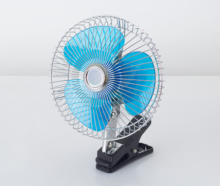 Portable small fan isolated on white background