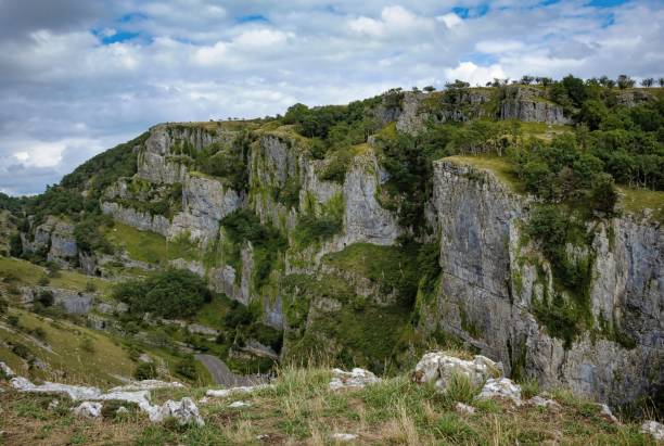 istock Cliffs of Cheddar Gorge from high viewpoint. High limestone cliffs in canyon in Mendip Hills in Somerset, England 1270621918