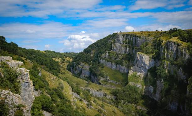 istock Cliffs of Cheddar Gorge from high viewpoint. High limestone cliffs in canyon in Mendip Hills in Somerset, England 1270621940
