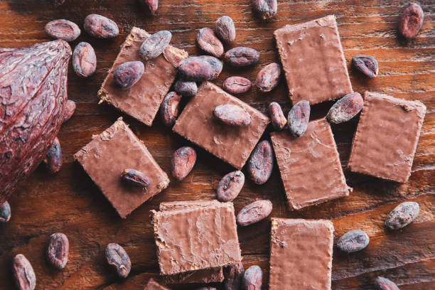 istock Chocolate and Cocoa Beans with Cocoa On a black background 1270623367
